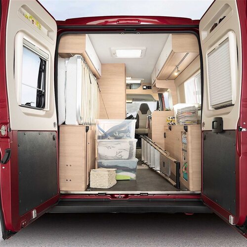 Storage concept | Uniquely flexible storage space with removable bulkhead, opening up a continuous storage area through to driver's cabin.